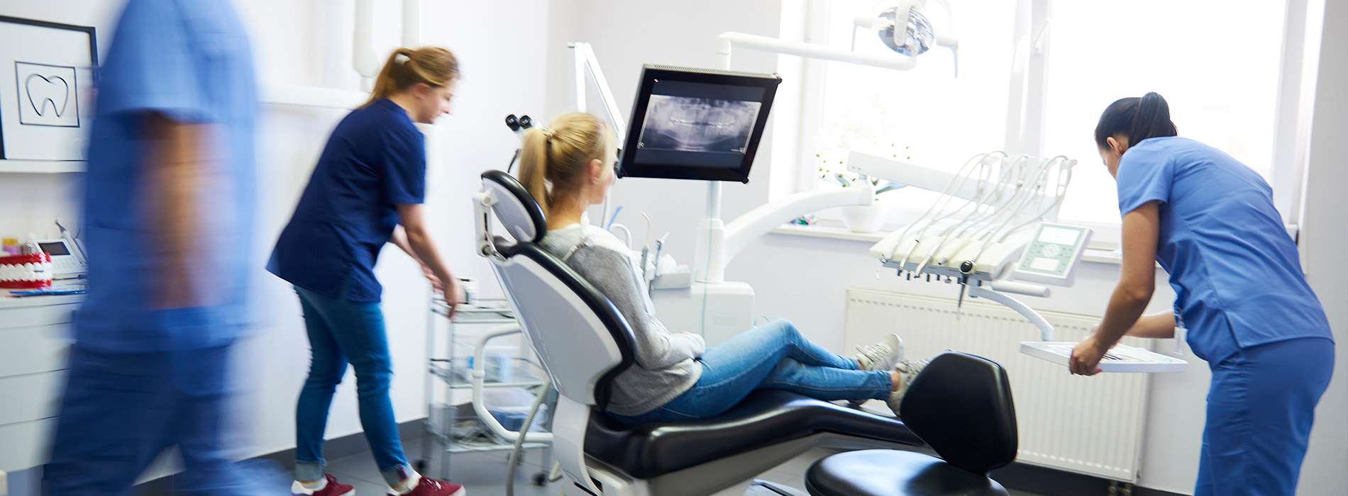 A collage of four images featuring healthcare professionals in a dental office setting, with one image showing a patient receiving treatment.